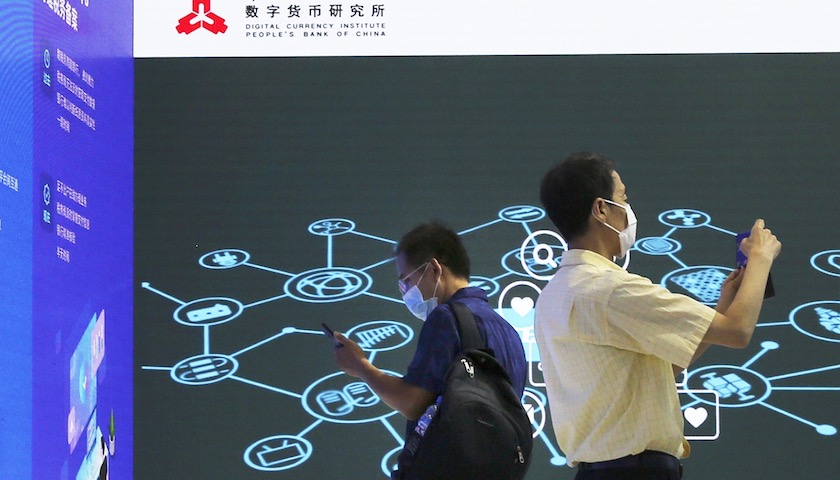 中國人民銀行副行長范一飛強調數字人民幣的法償性及其在M0定位下的法律合規要求